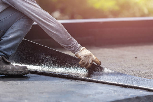 Professional Basement Waterproofing technician working in Selden, NY
